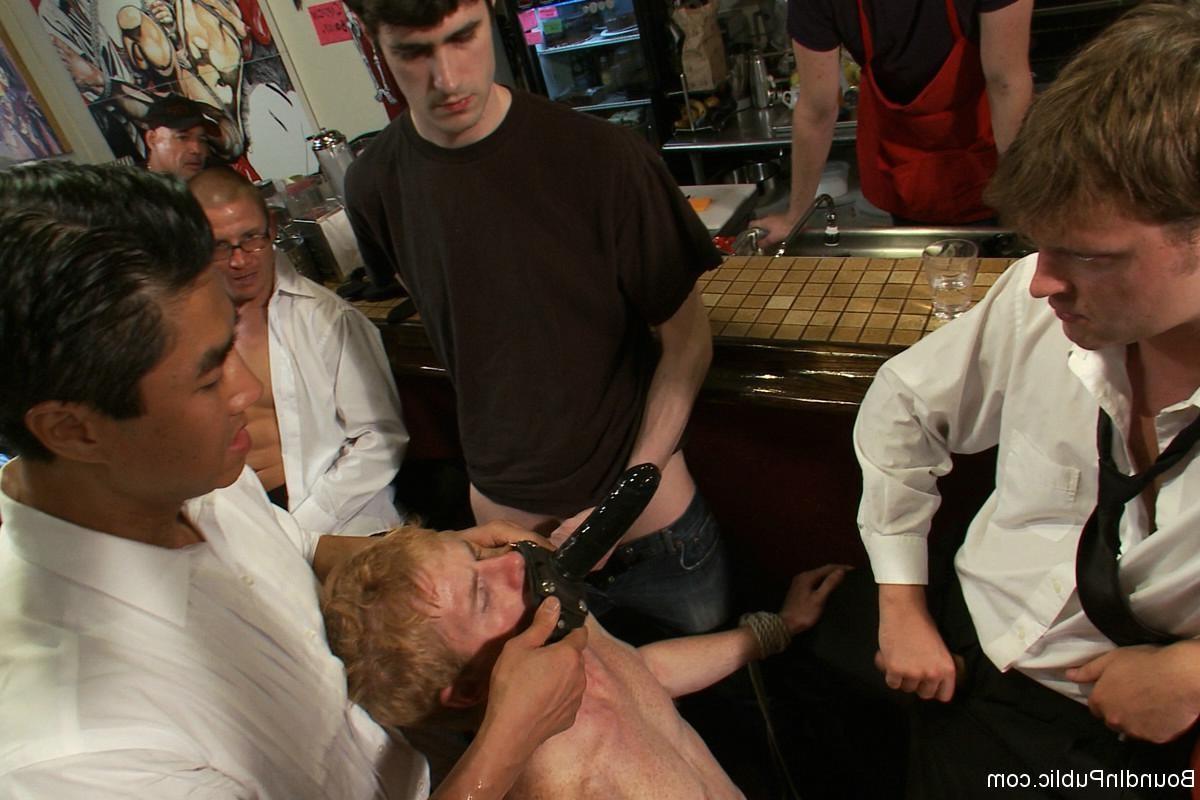24P Slave gay gets tied and fucked by group of gays in public bar