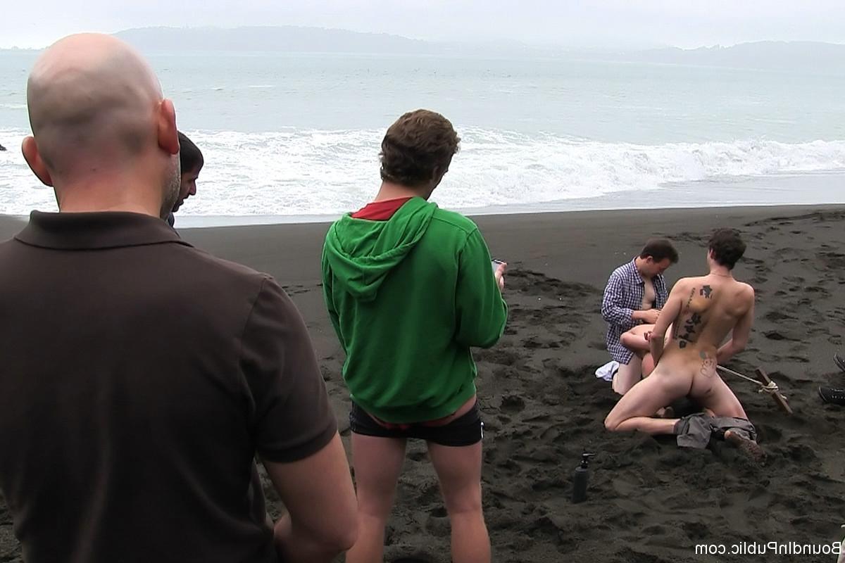 24P Gay being used and abused outdoor on a public beach.