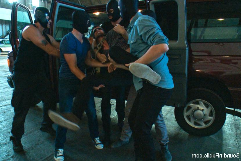 15P Captured stud is gang fucked in a bar full of horny masked men