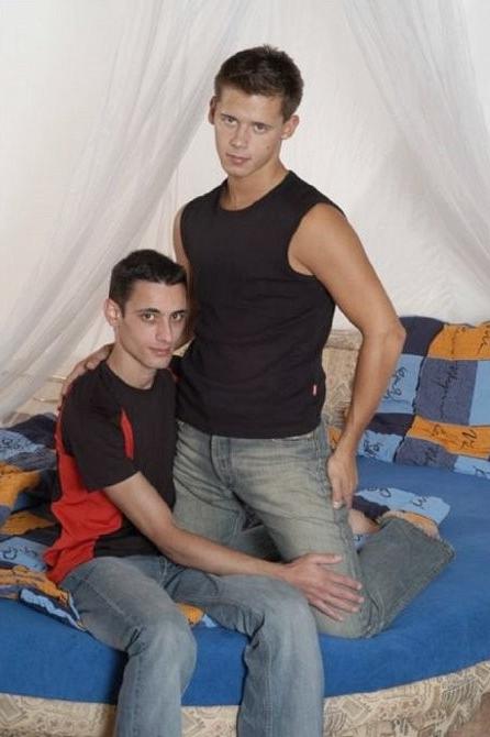 20P Two tanned smooth fellows sucking and fucking in a bed room