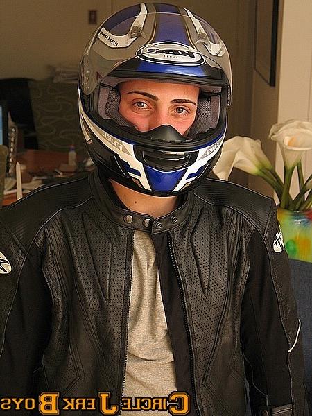 14P Biker hunk takes off his shirt
