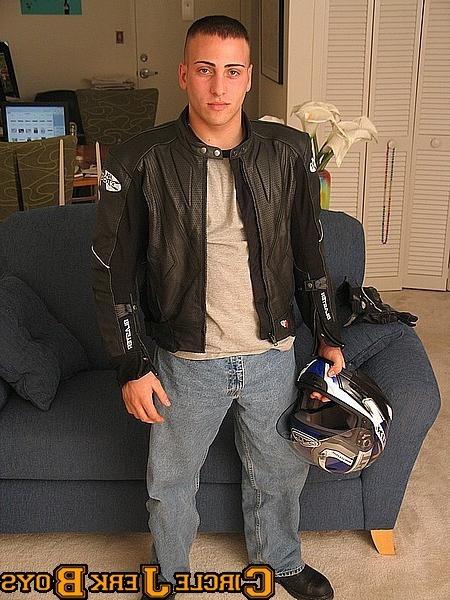 14P Biker hunk takes off his shirt