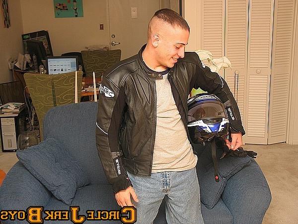 14P Biker hunk takes off his shirt
