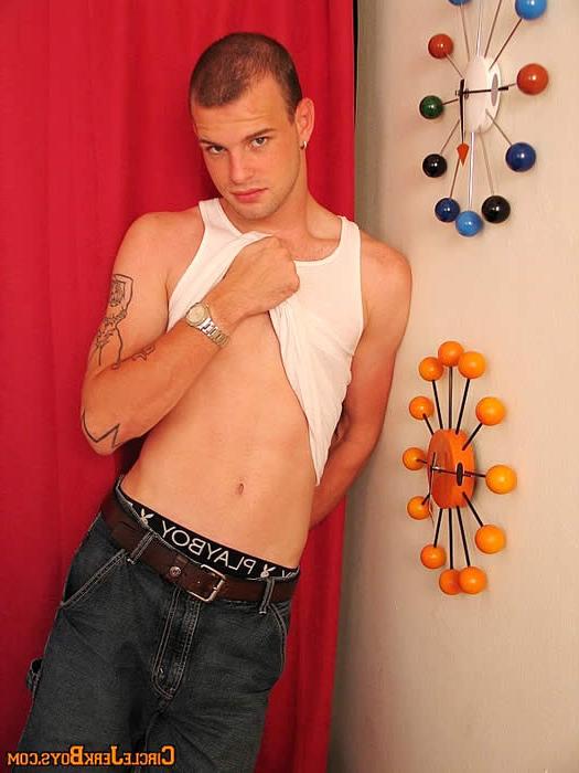 15P Sexy amateur gay stud undressing in a living room