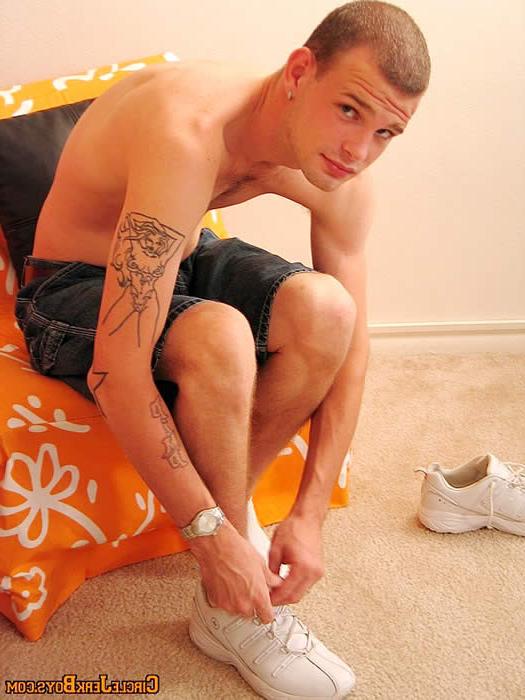 15P Sexy amateur gay stud undressing in a living room
