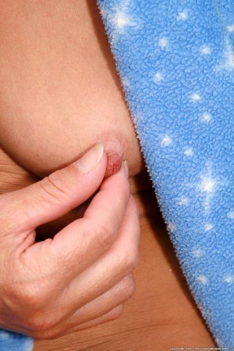 16P Granny Slips Off Her Bath Robe and Into Hot Water