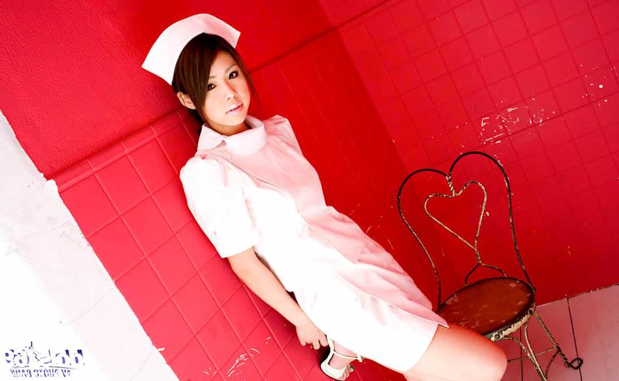 15P Busty japanese girl in a nursing uniform