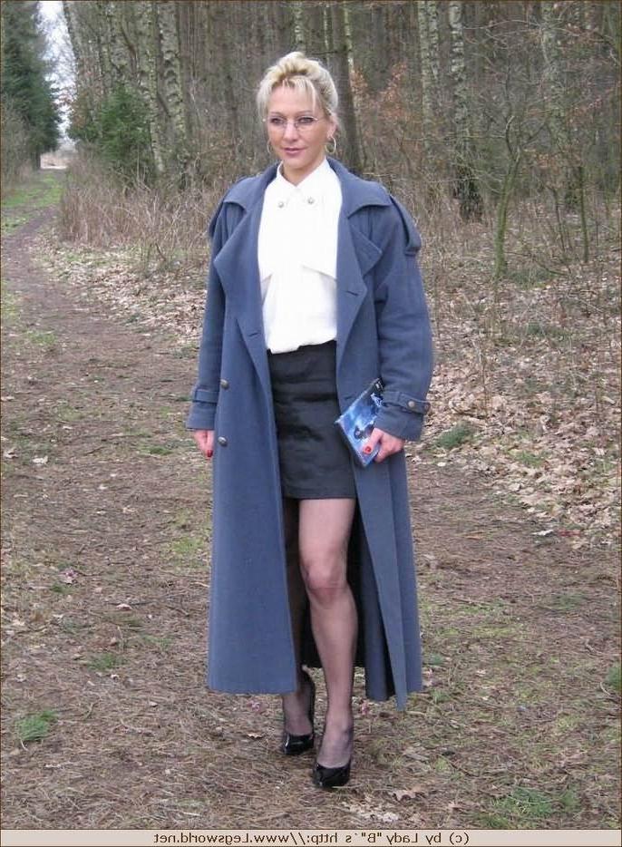 12P Elegant milf in stockings posing outdoors