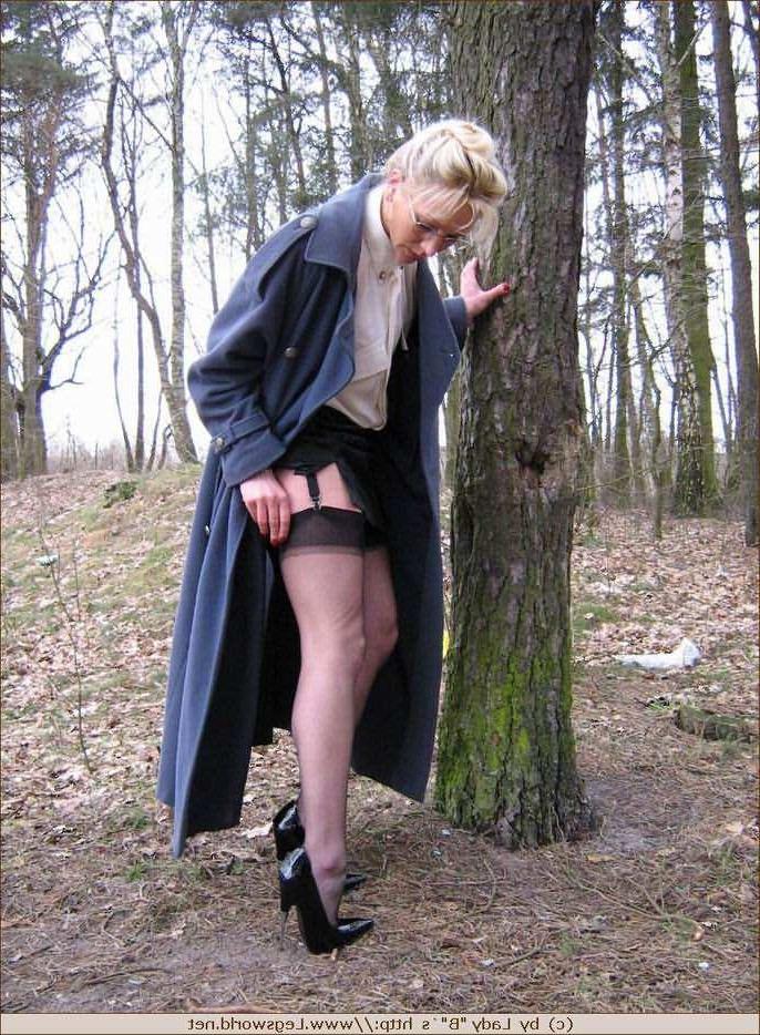 12P Elegant milf in stockings posing outdoors