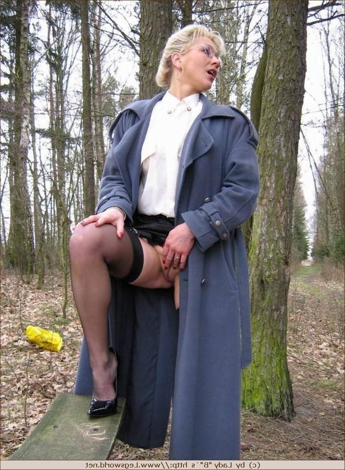 12P Elegant milf in stockings posing outdoors