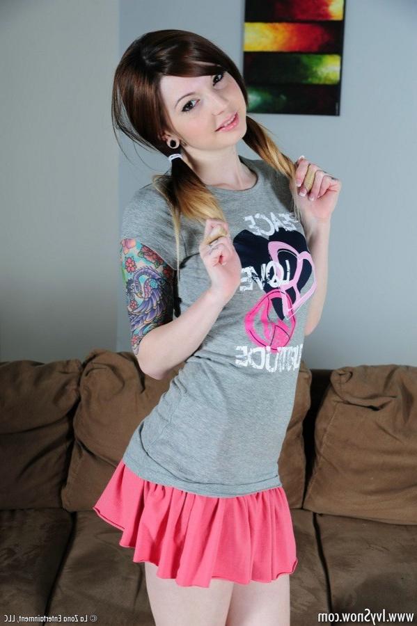15P Sweet tattooed teen shows her cute pink bra and panties