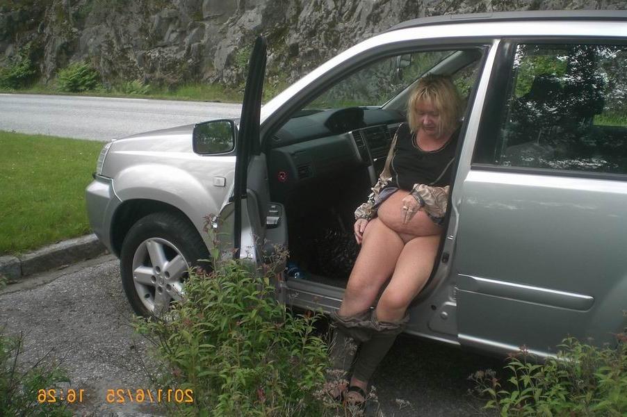 12P Cellulite mature posing on her car
