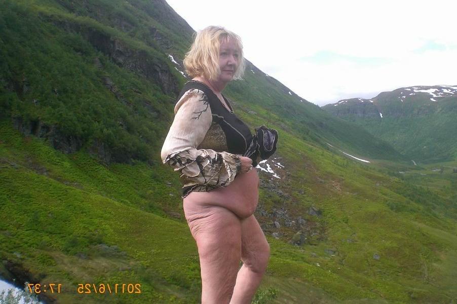 12P Cellulite mature posing on her car