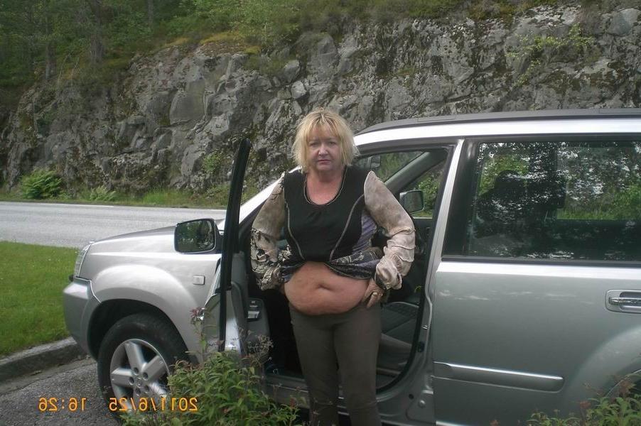 12P Cellulite mature posing on her car