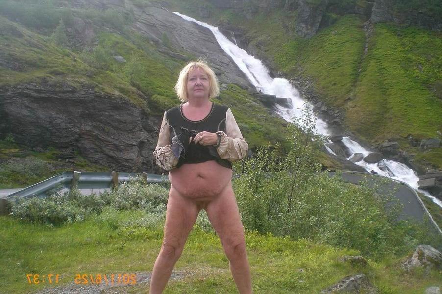 12P Cellulite mature posing on her car