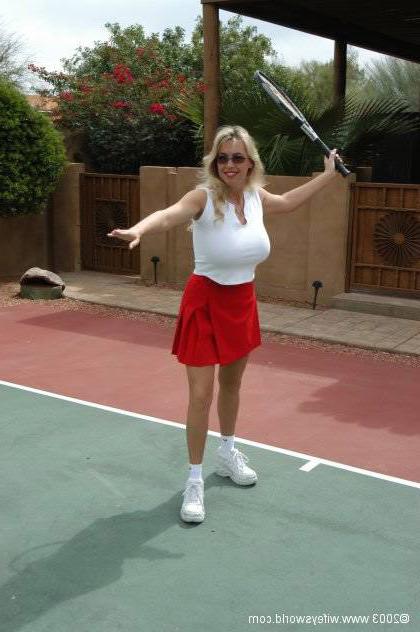 14P Busty blonde lady topless on the tennis court