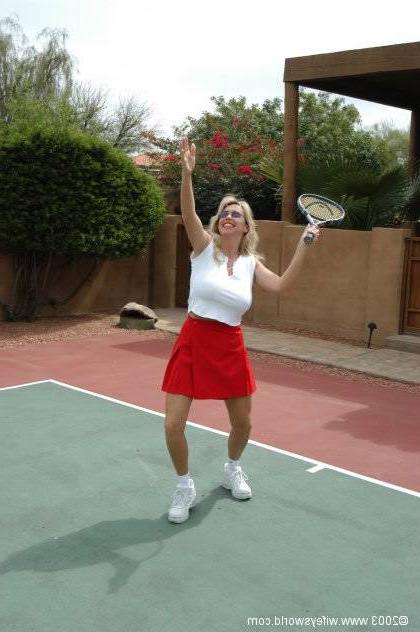 14P Busty blonde lady topless on the tennis court