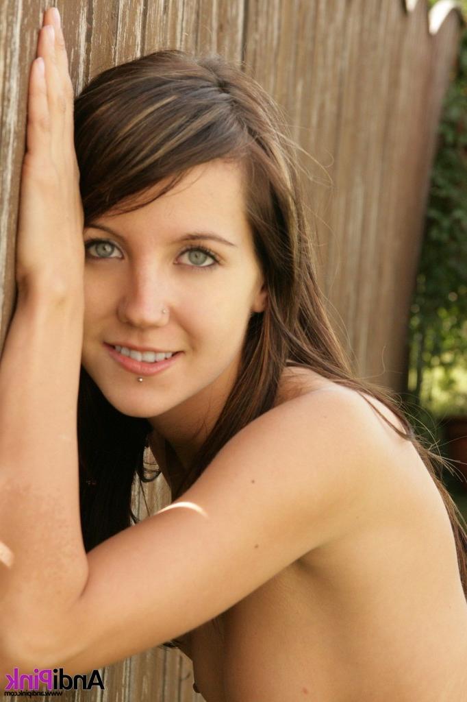 16P Smiling teen girl nude outside