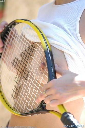 22P Brunette inserting tennis rack