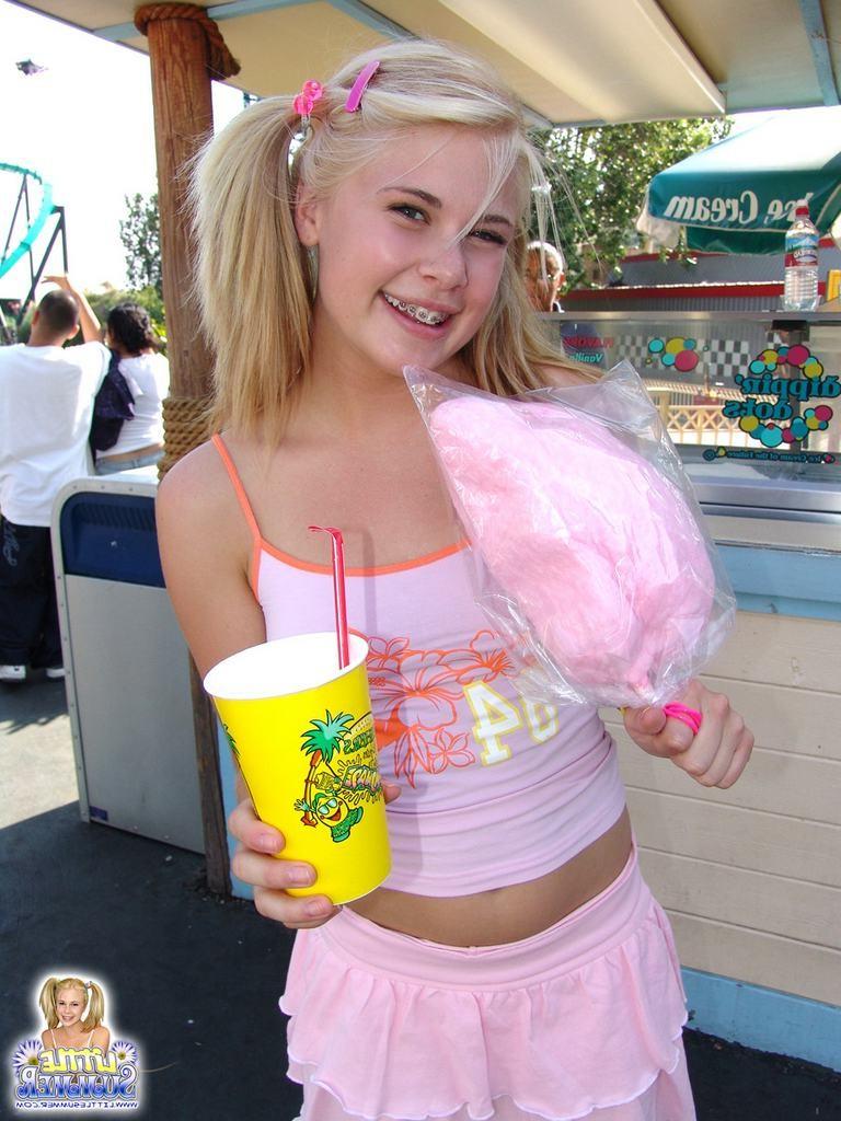 15P Pigtailed teen with braces amusement park flashing