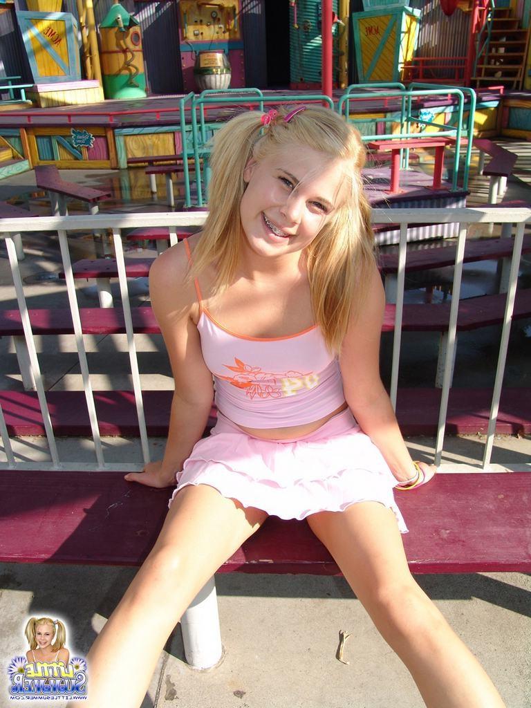 15P Pigtailed teen with braces amusement park flashing