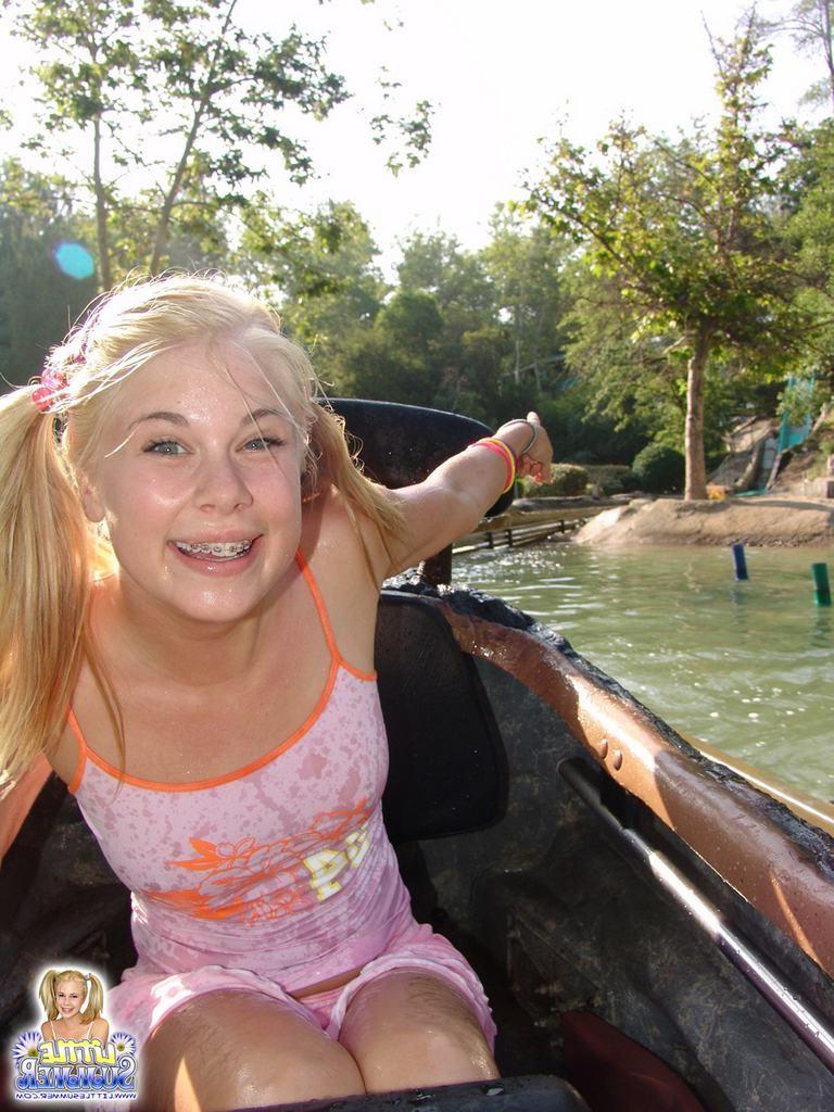 15P Pigtailed teen with braces amusement park flashing