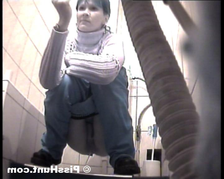 14P Two peeing girls unaware of spy cam in toilet