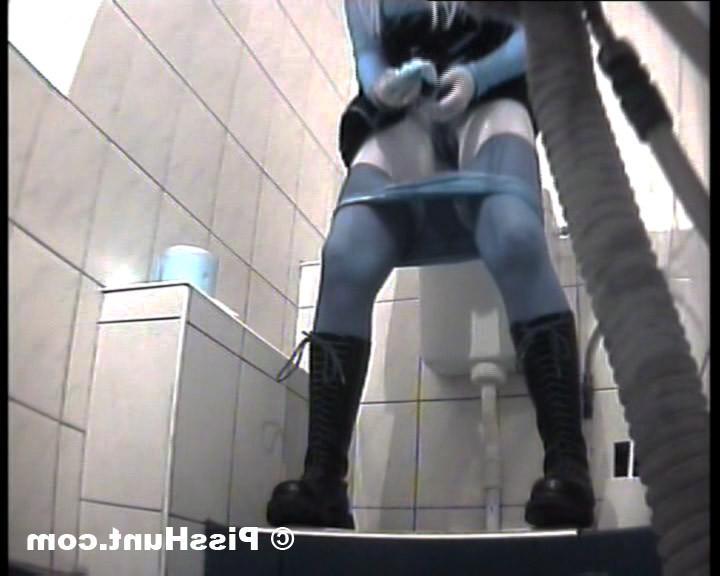 14P Two peeing girls unaware of spy cam in toilet