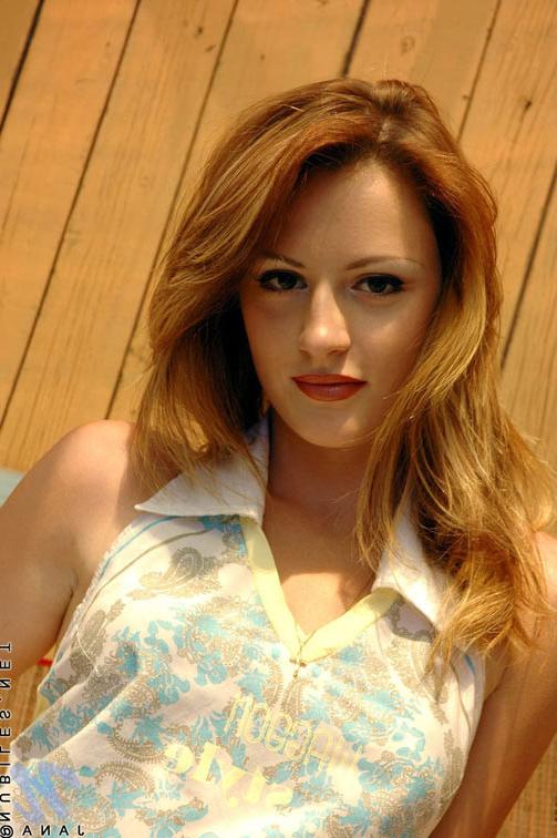 24P Tiny redhead babe strips totally naked in her room