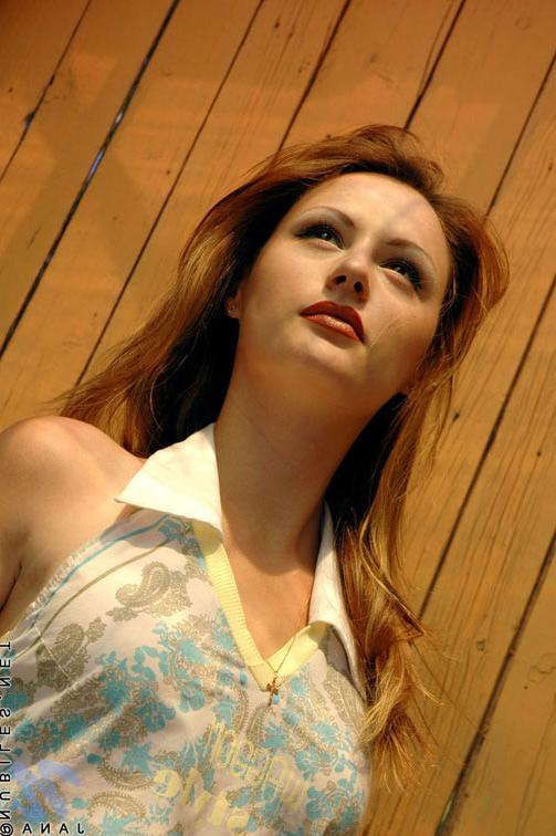 24P Tiny redhead babe strips totally naked in her room