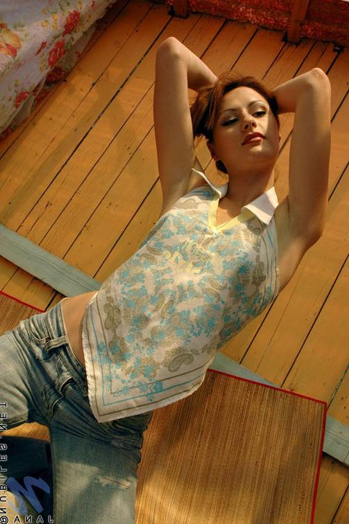 24P Tiny redhead babe strips totally naked in her room