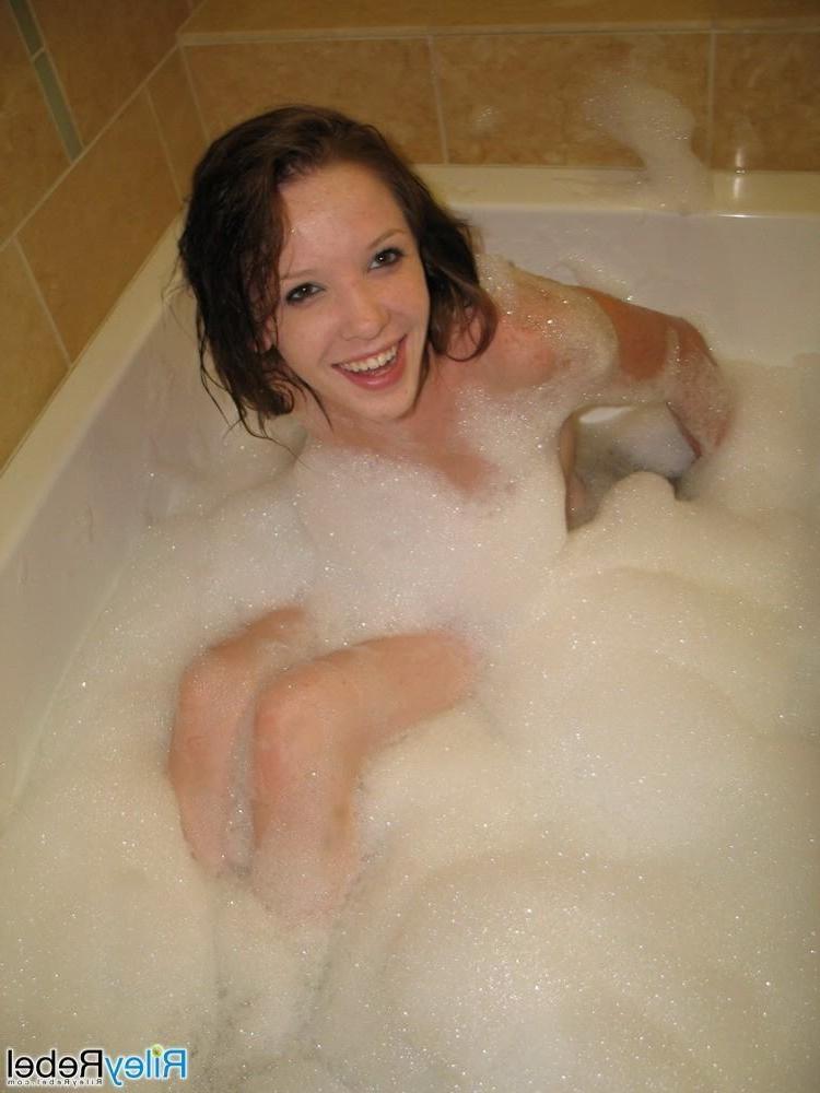 15P Small titted eighteen year old takes sudsy bath