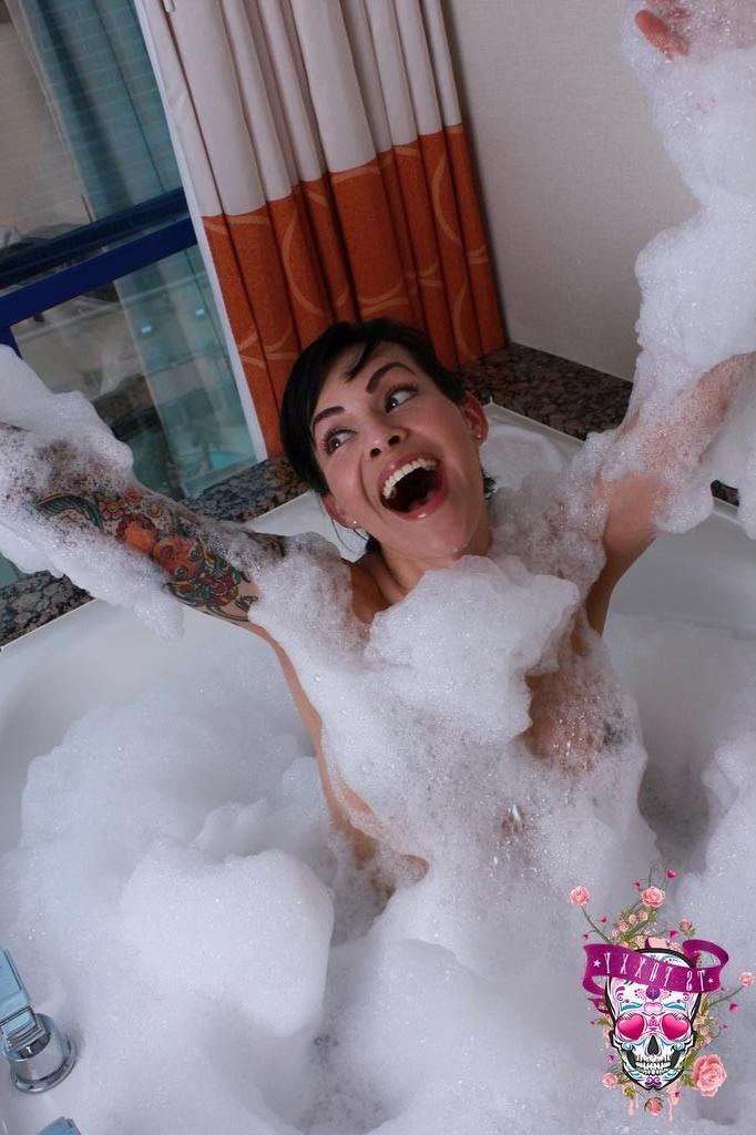 12P Busty beauty tranny Foxxy takes a bath