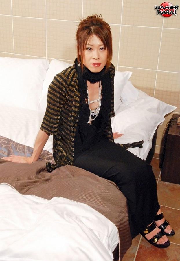 15P Slutty Japanese Tgirl Gets Her Cock Stiff And Cums