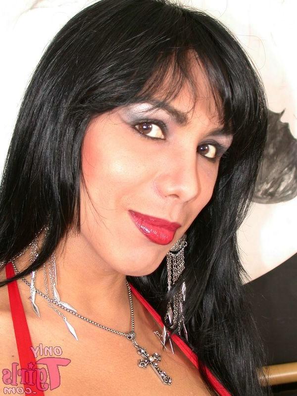 15P Sexy Latina Tgirl Spreads Her Legs Wide On The Bed