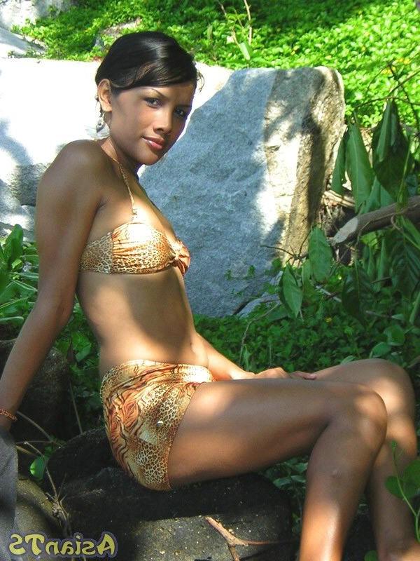 15P Beautiful petite thai ladyboy stripping and posing