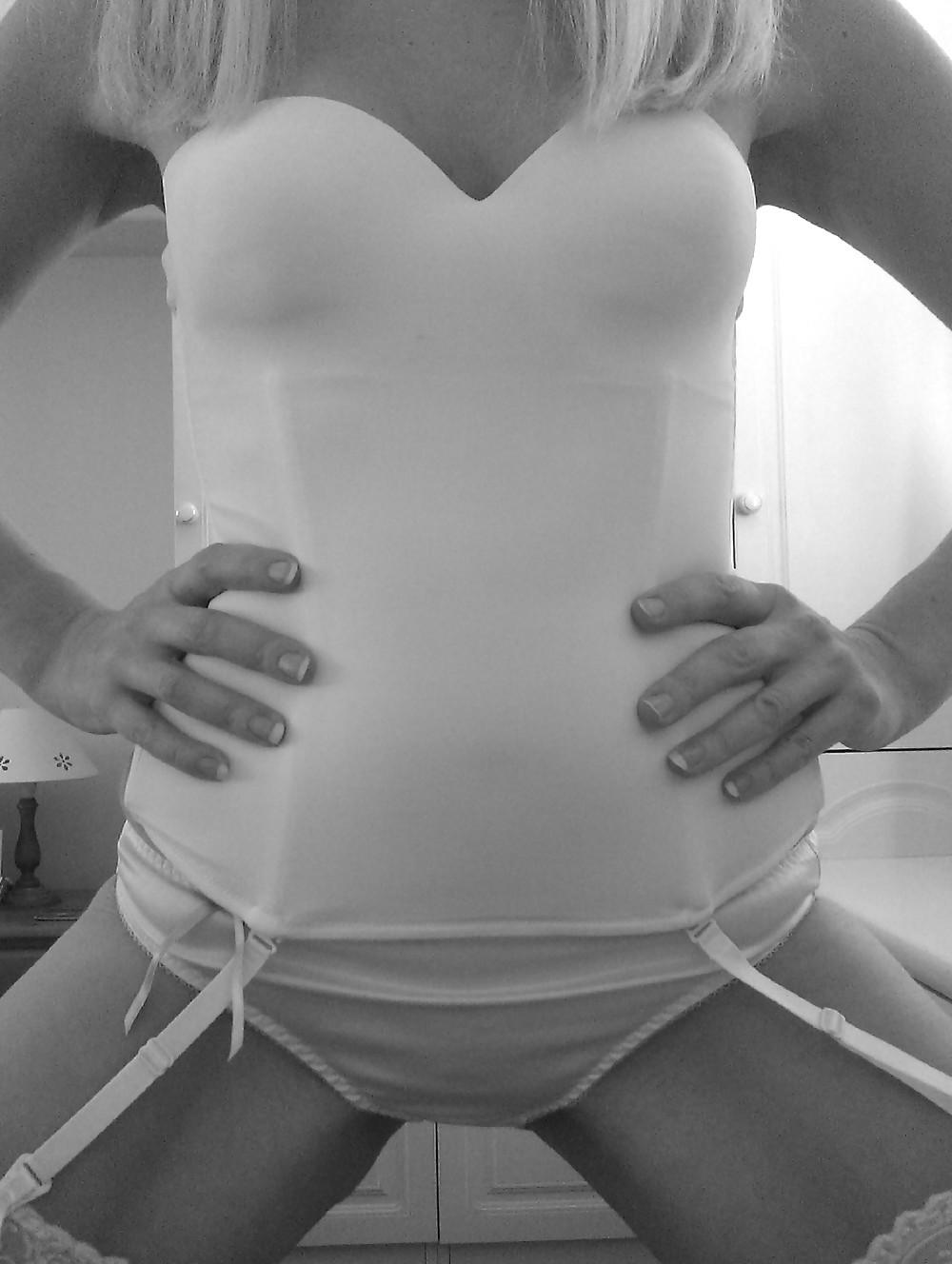 10P Blonde milf in white basque and stockings