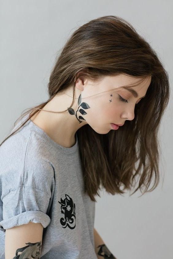 25P Face tattoo women.