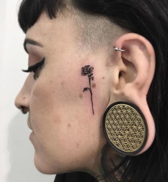 25P Face tattoo women.