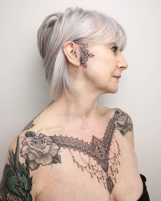 25P Face tattoo women.