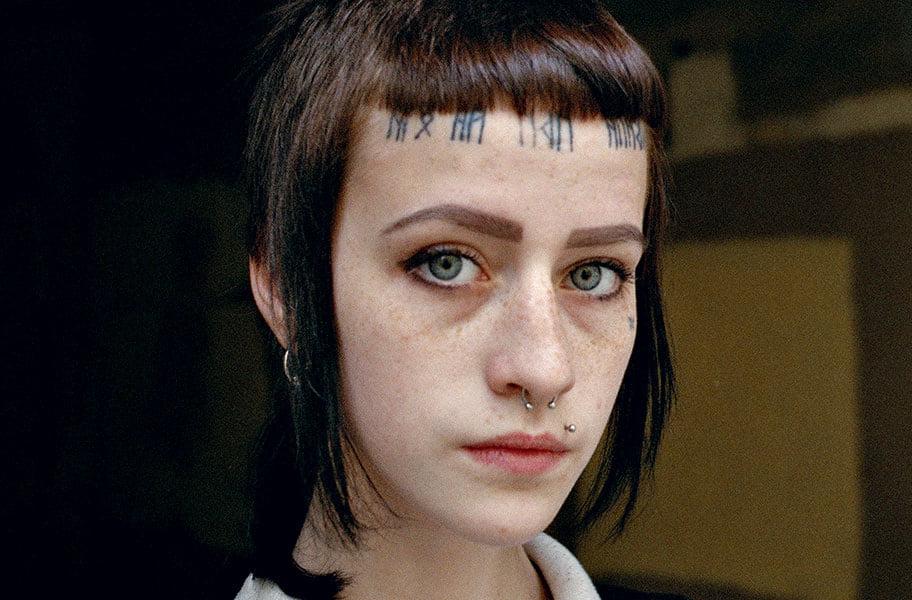 25P Face tattoo women.