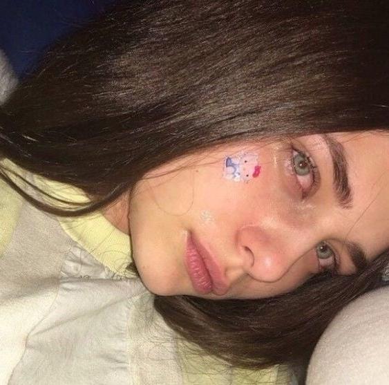 25P Face tattoo women.