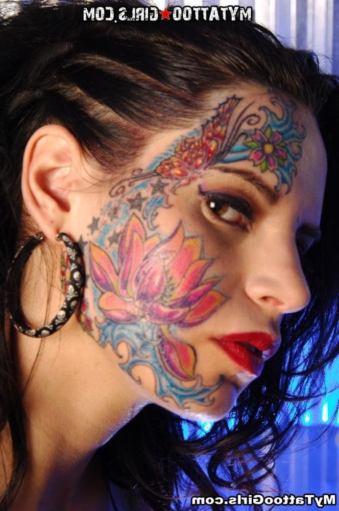 25P Face tattoo women.