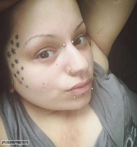 25P Face tattoo women.