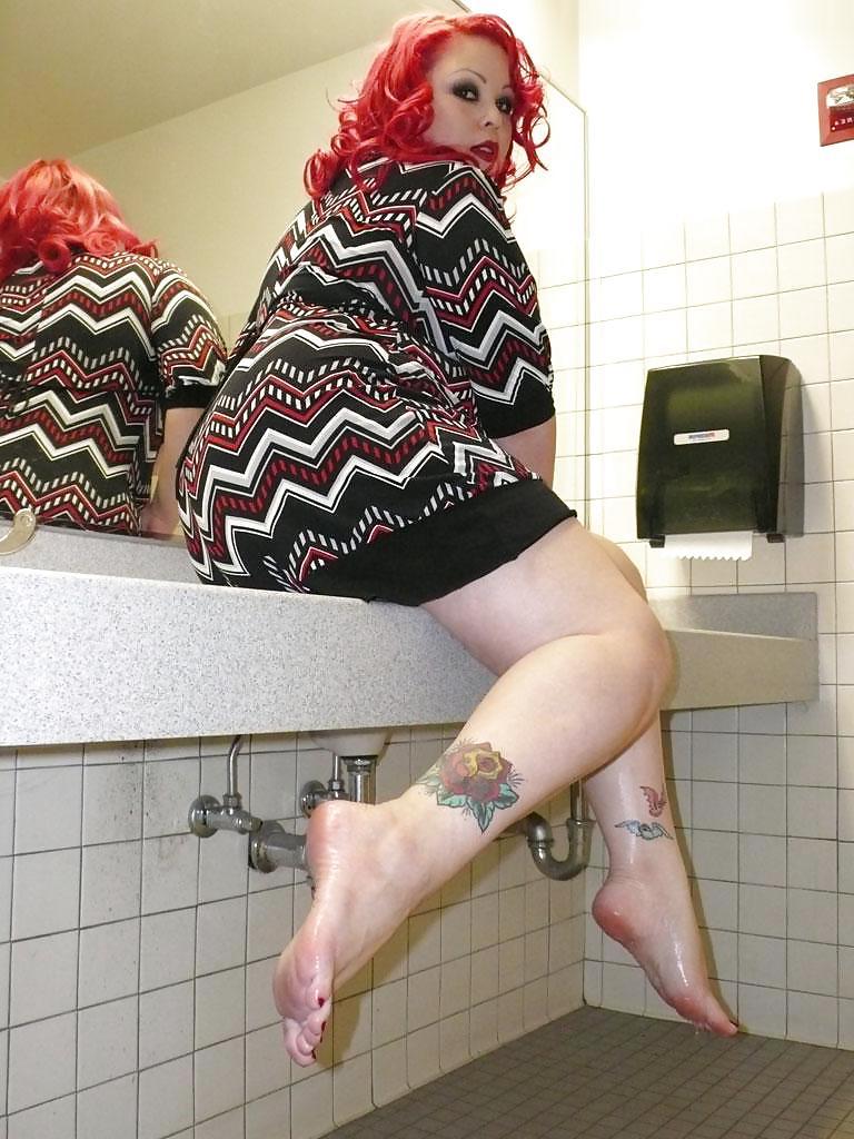16P April washes her feet in the ladys room
