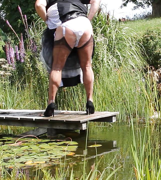 25P Sissy bath fully dressed in a pond, and was observed to