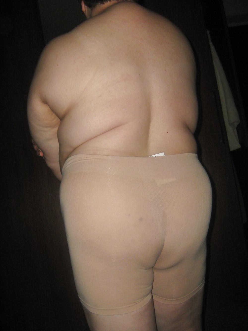 11P Fat granny in trousers.