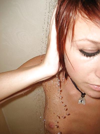7P Cool brunette in the bathroom with the camera.