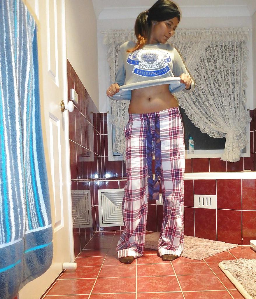 23P A Pakistani chick stripteasing in bathroom - selfshot