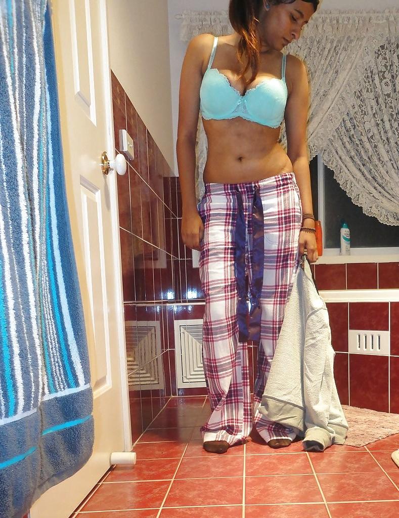 23P A Pakistani chick stripteasing in bathroom - selfshot